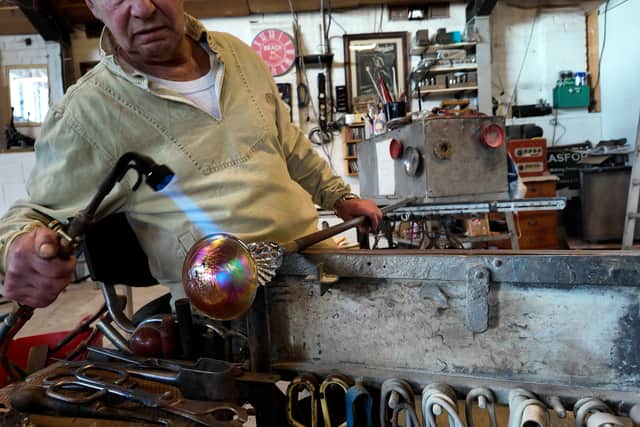 John says that although he’s been a glassmaker for over 43 years, he’s “still learning”
