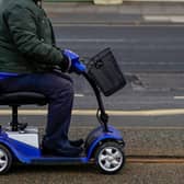 A 6ft 7in man on a mobility scooter smelled strongly of cannabis when police stopped him for driving erratically