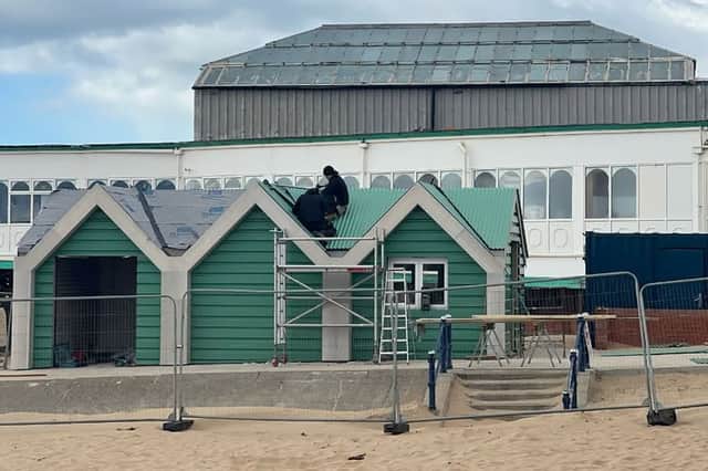 Works at the new Beach Hub are progressing, with a shiny green roof now on!