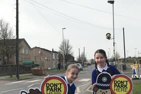Pupils with the new road safety signs outside Mereside Academy in Blackpool