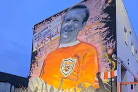 The huge mural to legendary player Jimmy Armfield is now illuminated at night