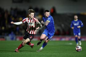 Blackpool have been linked with a move for Cheltenham winger Jordan Thomas.