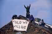 Inmates on the roof of Strangeways Prison in Manchester protesting over living conditions, April 1990. A prisoner and a prison officer died in the riot and the prison was later renamed HM Prison Manchester. (Photo by Tom Stoddart/Hulton Archive/Getty Images)