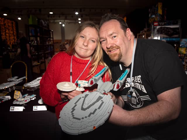 Dean Tomlinson with his daughter Ella, 11, sharing an impressive Star Trek themed LEGO collection