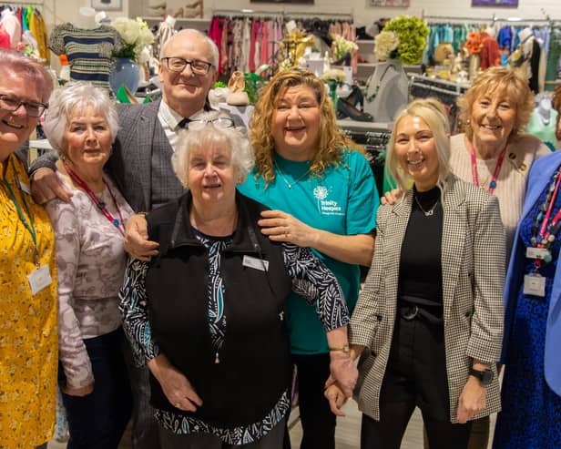 Cheryl Fergison (centre) officially opens the new Trinity Hospice charity superstore in Cleveleys