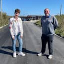 Coun Julie Sloman (left) with Andy Lee at the newly resurfaced road at Tee Time Golf