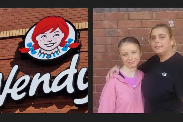 Eloise Errington (with mum Charlene) was upset after beun  tured away from the Wendy's free burger queue in Blackpool