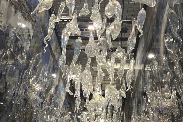 The reworked John Ditchfield glass chandlier in the toilets at the Beach House Blackpool.
