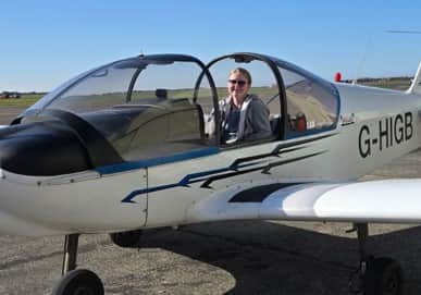 Amy Atkinson in the plane