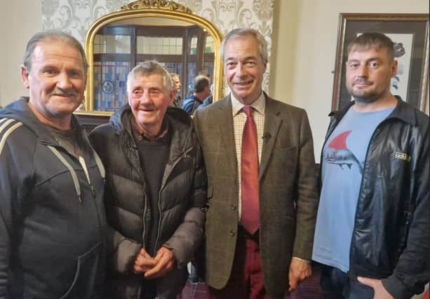 Nigel Farage with Fleetwood's last remaining fishermen - from left, john worthington, Billy mcGoff and Dave Pilling