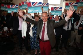 Nigel Farage is given a big welcome at Fleetwood's Strawberry Gardens pub. Photo: Stuart Mitchell
