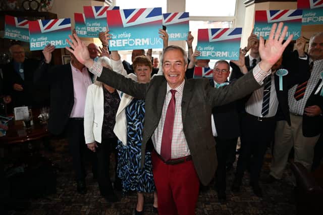 Nigel Farage is given a big welcome at Fleetwood's Strawberry Gardens pub. Photo: Stuart Mitchell