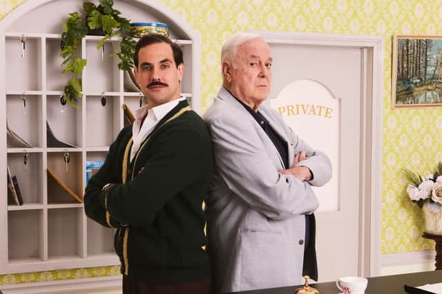 The two Basil Fawltys... Danny Bayne (right) takes the role made famous by John Cleese (right) in the original Fawlty Towers TV show.