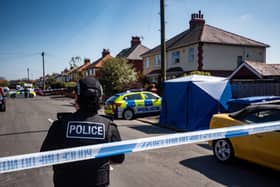 A police tent has been put in place at the scene in Cross Street, St Annes 