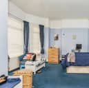 The main bedroom in this three-bedroom family home on Oldpark Road, Belfast, with a guide price of £200,000 to £210,000