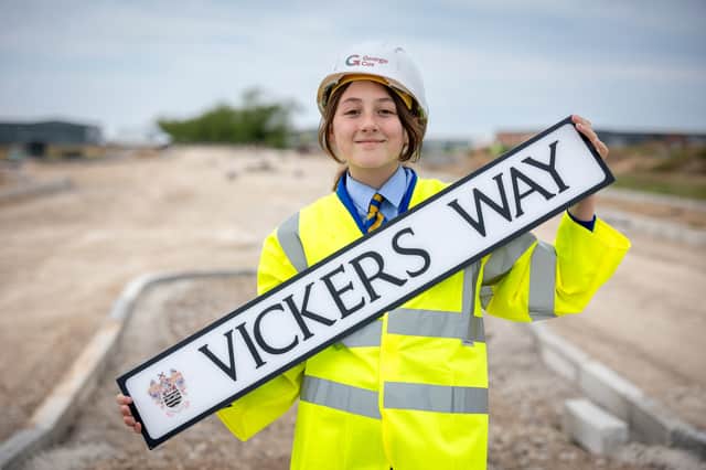 Year 6 pupil Bethan Lowe with 'Vickers Way' - honouring Blackpool's wartime aviation and the historic Vickers factory