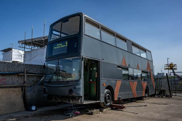 Dan Atkins with the help of Roy Magle has coverted a bus into a two bedroom home complete with a kitchen, bathroom and living area.
