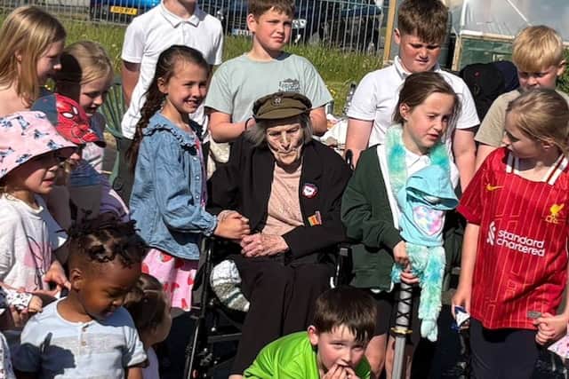 Marjorie Hanson, 102 (centre) enjoyed a VE Day family picnic at Weeton Camp
