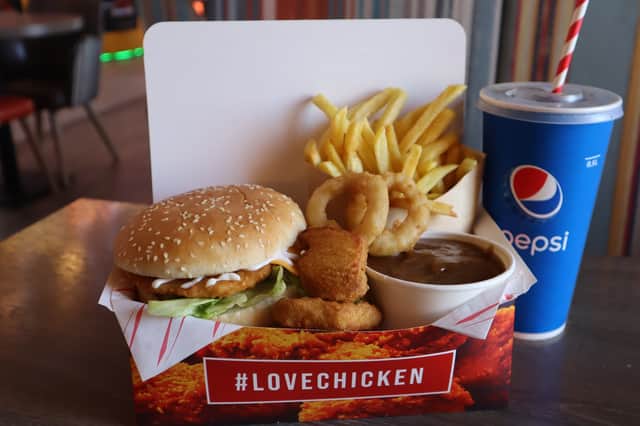 Cafe Coast chicken burger with nuggets, onion rings and fries