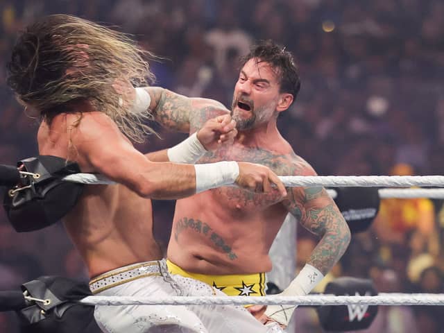 CM Punk looks to book his place at this year's Money In The Bank ladder match - and over his shoulder at the threat of Seth Rollins and his new faction.