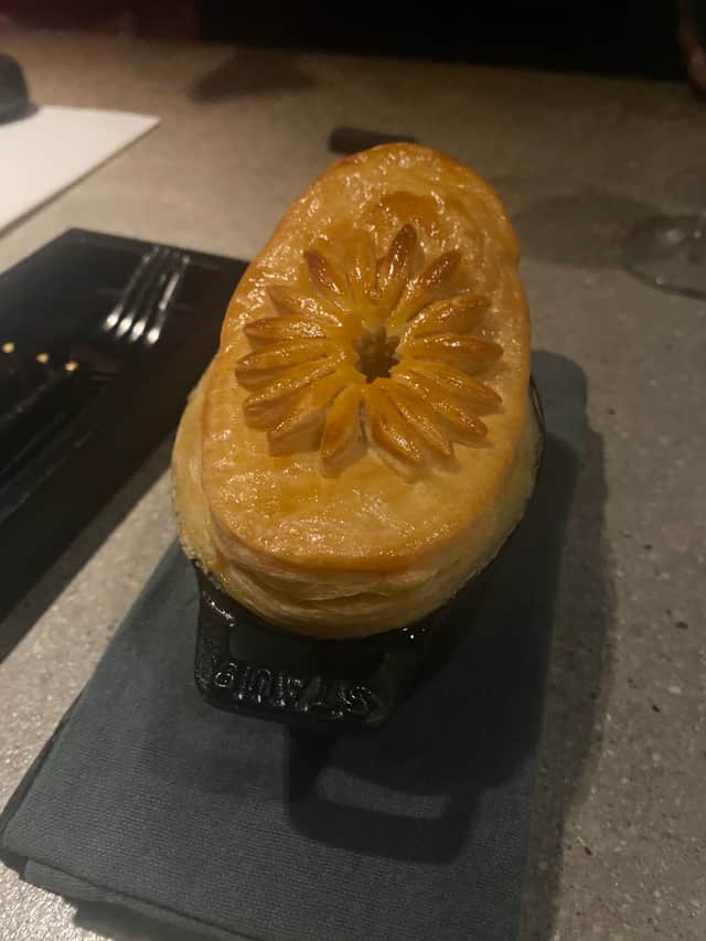Potato and cheese pie with floral design