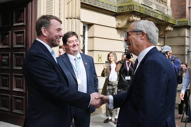 New Lancashire County Council leader Stephen Atkinson welcomes Nigel Farage to County Hall in Preston