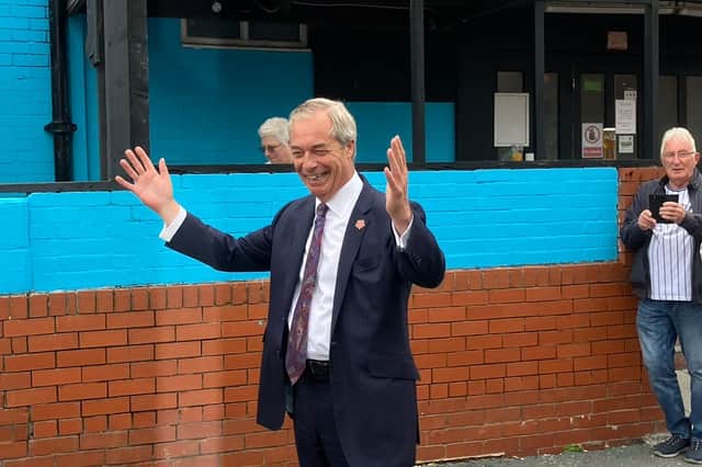 Nigel Farage outside the newly rebranded Reform UK pub, The Talbot.