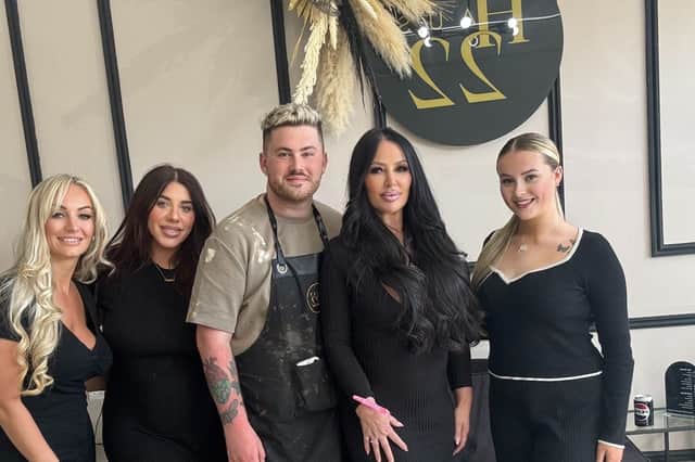 Kieron pictured with his work colleagues.