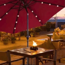 The Outsunny parasol with solar-powered LED lights creates a cosy and inviting glow for evening gatherings