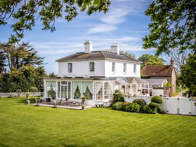 The £3 million house sits in 1.34 acres of private, manicured gardens