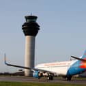 Manchester Airport ATC tower with Jet2 aircraft