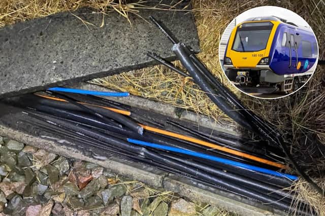 Rail passengers and motorists faced major disruption this morning after vandals cut through key railway cables in Poulton-le-Fylde