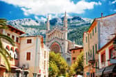 Sóller in Mallorca is known for its stunning mountain views, traditional architecture and sunny Mediterranean charm