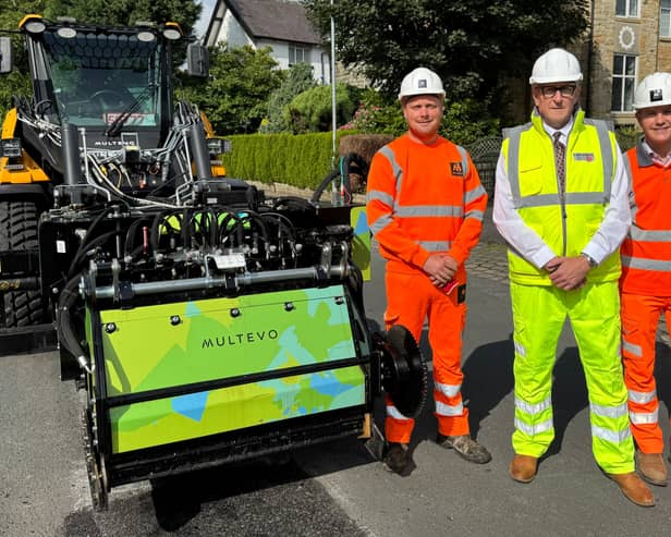 County Cllr Warren Goldsworthy (centre) has high hopes for the new pothole-filling technique being used in Lancashire