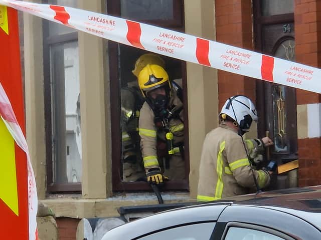 Fire crews tackle blaze at 'derelict' property as residential road is ...