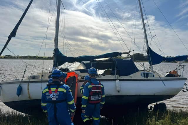 Two kittens were rescued alongside three crew members after a vessel ran aground near Over Wyre