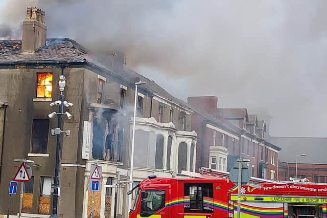 Flames from what is believed to be the site of the former Carlton Hotel.