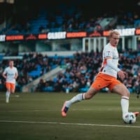 Blackpool midfielder makes comparison to former Leyton Orient boss as he reflects on start to life under Ian Evatt