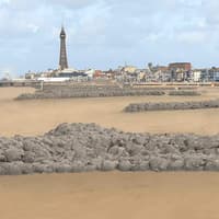 If we don't agree on rock groynes we could lose our current 100 per cent funding , says Blackpool report
