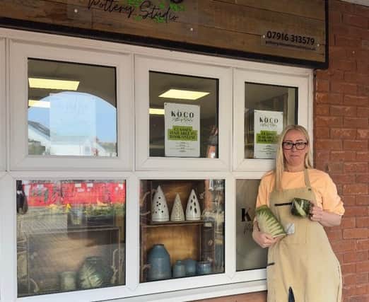 Kelly Monks outside the Koco Pottery Studio in Thornton