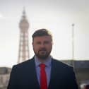 A Blackpool man is due to appear in court this week charged with a public order offence following an incident at an event organised by a local MP