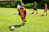 Free places at summer football camps are being offered to families in Blackpool this