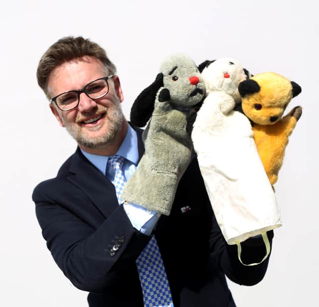 TV auctioneer Charles Hanson had his hands full with three of the most famous glove puppets in the world, owned by the legendary puppeteer Harry Corbett. They have been consigned for sale by his son Dave Corbett