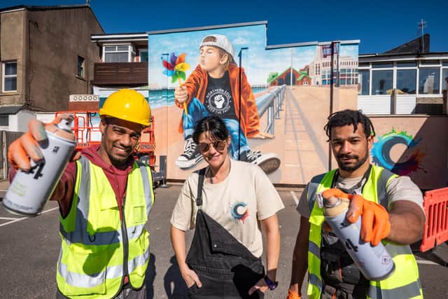 A mural in South Shore has been created by Coastal Colour Club,  a collaboration between House of Wingz & Panter Bros. Pictured are Will and James Panter with Sam Bell-Docherty from House of Wingz.
