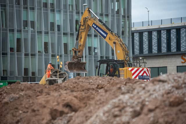 Building work takes place on the site for the new Multiversity. Photo: Lucinda Herbert