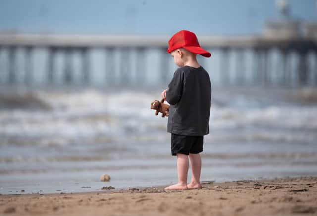 A youngster takes his Gruffallo to the beach  in Blackpool ahead of what promises to be a warm and sunny Bank Holiday weekend. Photo: Lucinda Herbert