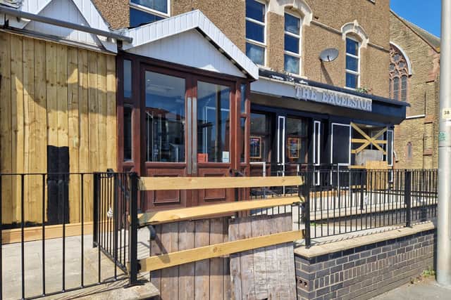 A pub near Blackpool FC's stadium has been boarded up and appears to be permanently closed.