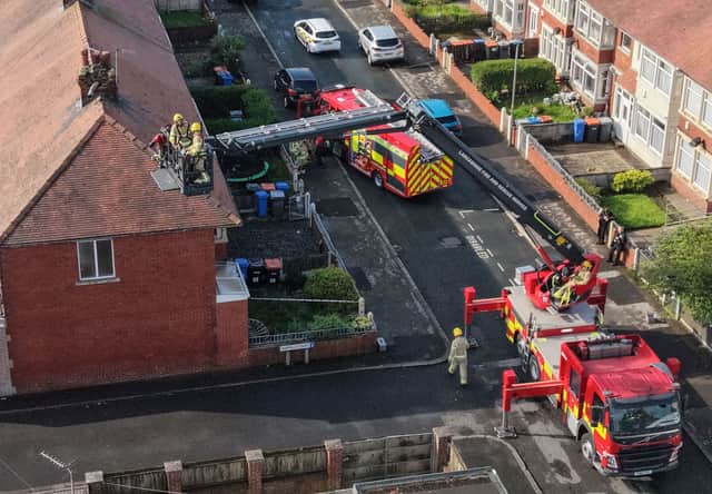 Drone footage catches firefighters working on Fleetwood house hit by lightning