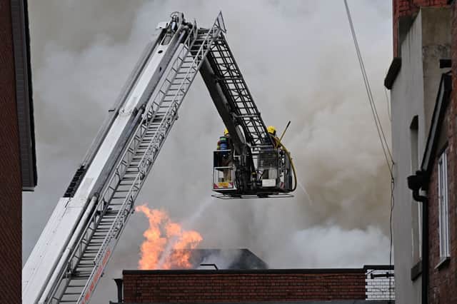 Firefighters are responding to a major fire at the former Ex Catalogue store and M&S in Lord Street, Fleetwood. Huge flames and thick black smoke can be seen billowing across the town