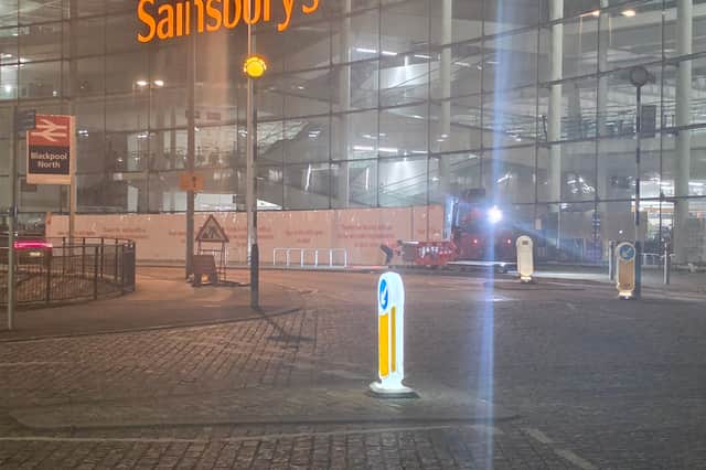 The hoardings being removed from the Talbot Road Sainsbury's store in Blackpool